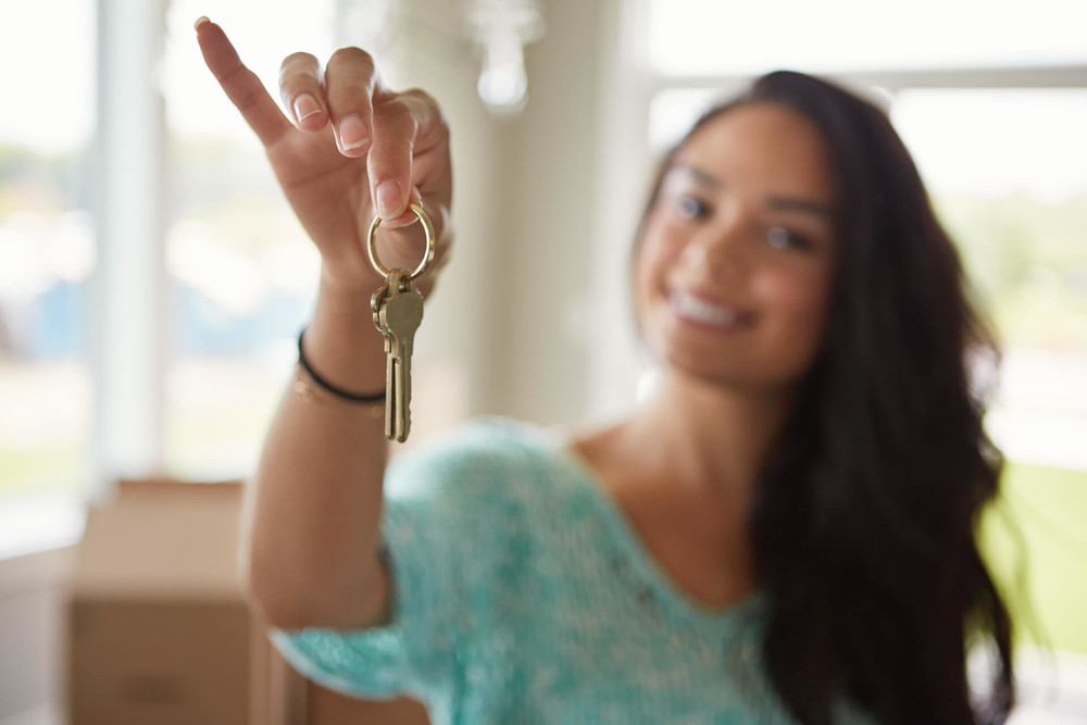 Turnkey rental property investment saleswoman