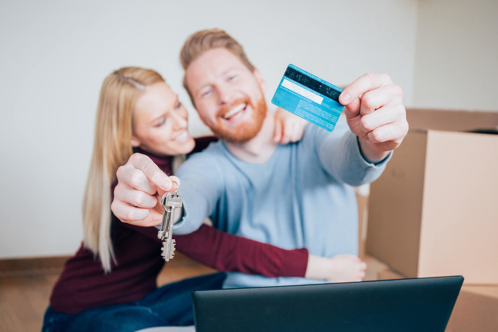 couple is paying their mortgage with credit card
