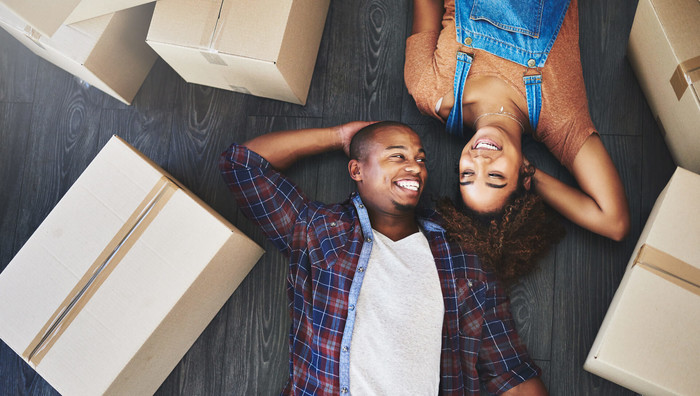 Couple discussing FHA loan requirements