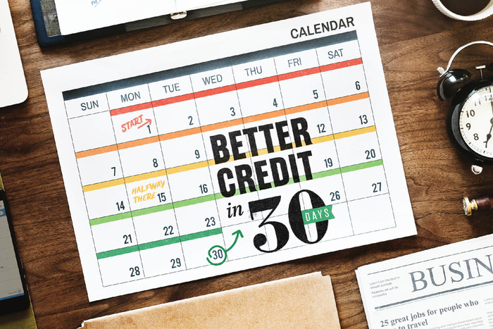 Calendar showing timeline for improving your credit score in 30 days